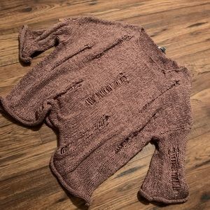 Distressed boutique sweater